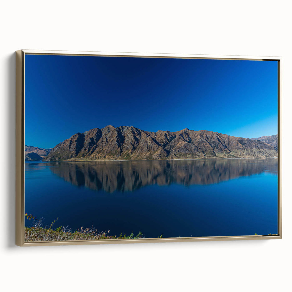 Framed canvas featuring a vintage-style landscape painting of Otago, New Zealand with black and gold tones.