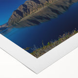 Art deco poster featuring a serene Otago, New Zealand landscape in soft blue and green tones on rolled canvas.