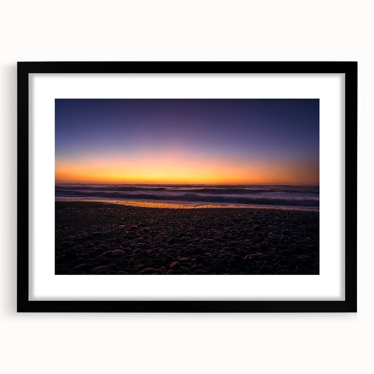 Extra large abstract art print of New Zealand's west coast in vibrant colors on a textured canvas, framed in black.