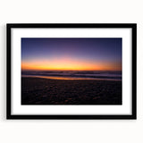 Extra large abstract art print of New Zealand's west coast in vibrant colors on a textured canvas, framed in black.