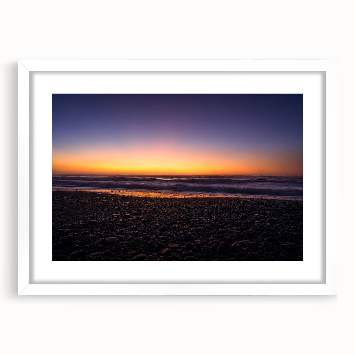 Abstract art print depicting the rugged New Zealand West Coast in muted earth tones on a framed white mat.