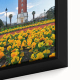 Framed canvas of a textured, colorful abstract design with black accents, ideal for large living room walls.