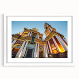 Abstract art print depicting a stylized Argentinian landscape in muted earth tones, framed with a white mat.