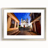 Textured abstract art print depicting a Brazilian landscape in earthy tones, framed in silver, ideal for bedroom art.