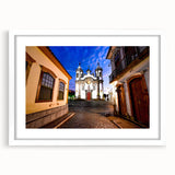 Abstract art print depicting a colorful Brazilian landscape on a white-framed mat, suitable for bedroom or dining room decor.