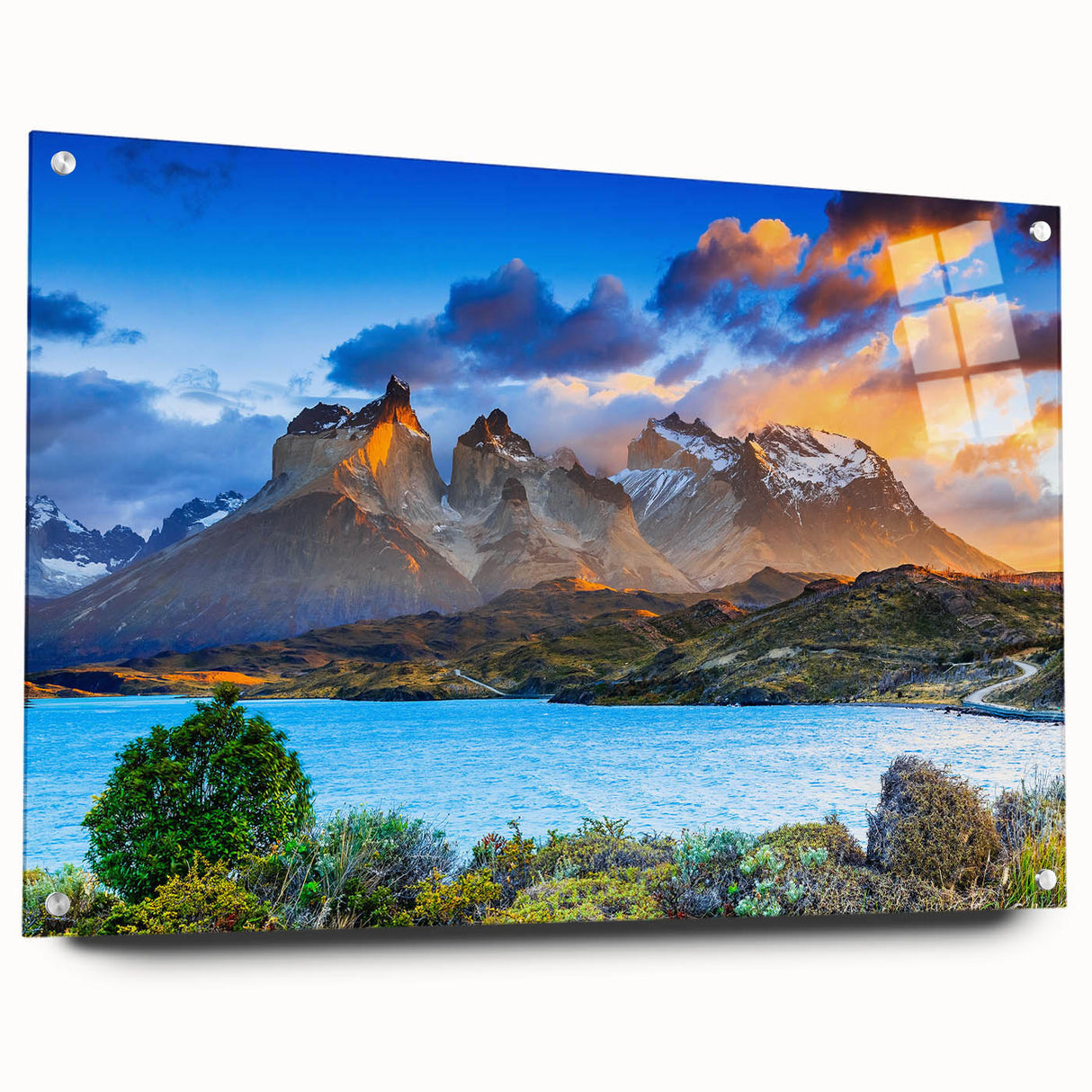 Large abstract wall art of a South American scenery in vibrant blues and greens on acrylic glass.