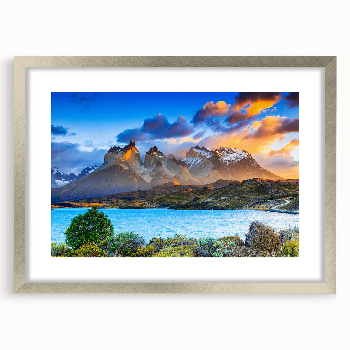 Textured abstract art print of a Chilean landscape in muted earth tones, framed in silver, ideal for bedroom art.