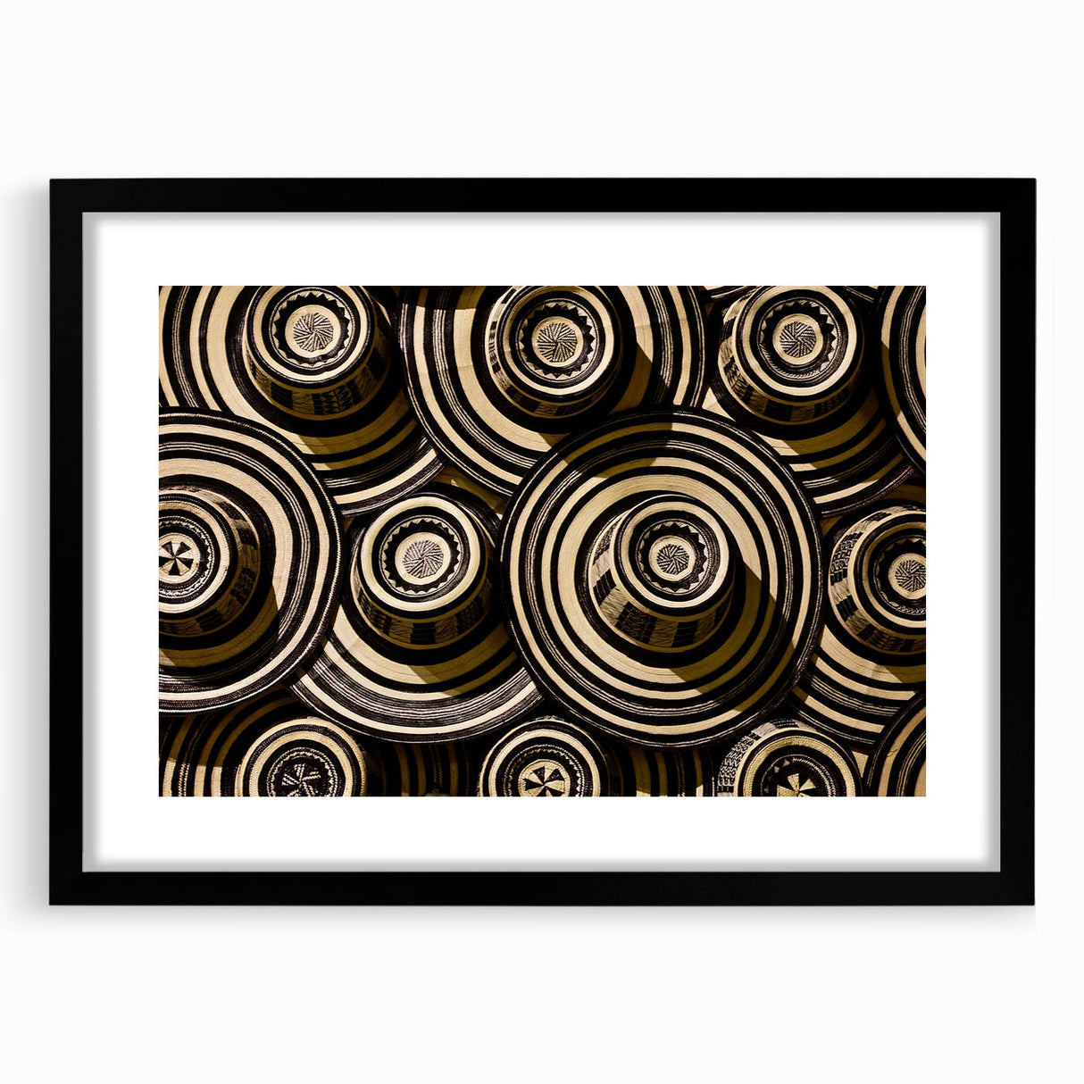 Extra large abstract art print featuring a colorful, textured depiction of a South American scenery on a framed black mat.