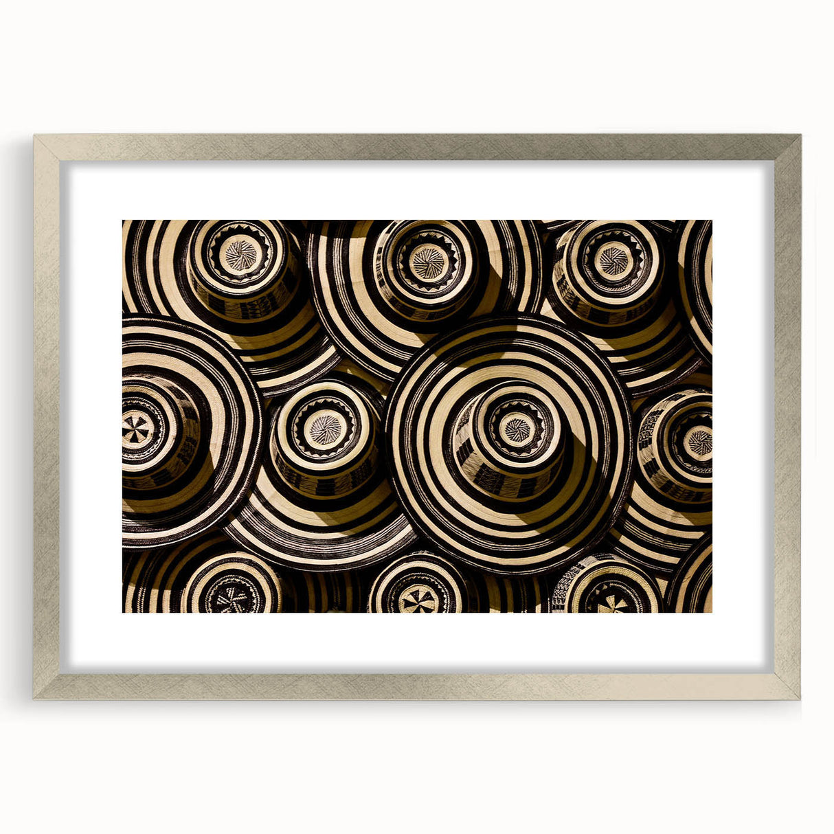 Textured abstract art print of a Colombian landscape in muted earth tones on framed canvas, ideal for bedroom art.