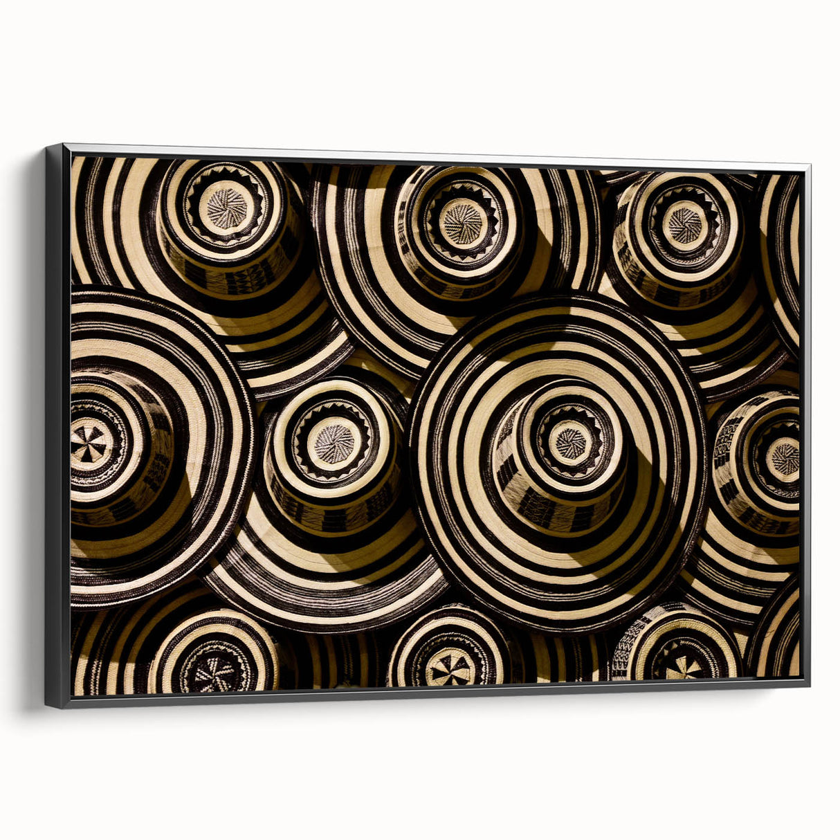 Black and white framed canvas featuring a vintage-style landscape painting of a Colombian scenery.