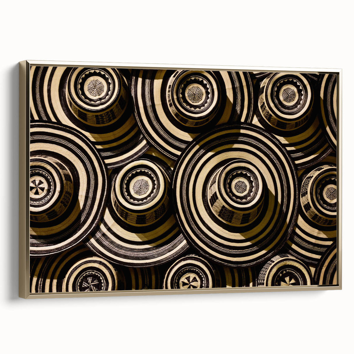 Framed canvas featuring a vintage-style landscape painting of a Colombian scenery in muted gold and black tones.