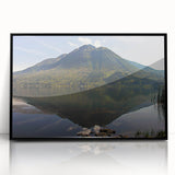 Large abstract wall art depicting a South American scenery in muted earth tones, framed in black acrylic.