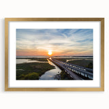 Extra large abstract art print of Alabama scenery in a gold frame, featuring textured hues of blue and green.