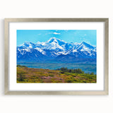 Textured art depicting abstract Denali scenery in Alaska, in muted earth tones on a silver-framed mat.
