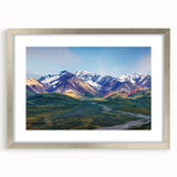 Textured art print of abstract Alaskan scenery in muted blue and gray tones on a framed canvas, suitable for bedroom decor.