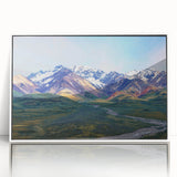 Acrylic print of an Alaskan landscape in subdued earth tones, framed in white, suitable for modern nursery decor.