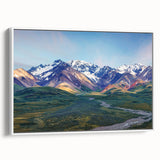 Vintage poster art of an Alaskan landscape on a framed canvas, featuring muted earth tones, ideal for living room decor.