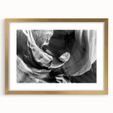 Extra large framed wall art of Antelope Canyon in Arizona, featuring textured layers in earthy red and orange tones.