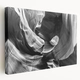 Antelope Canyon in Arizona depicted on a large stretched canvas, showcasing warm orange and red tones.