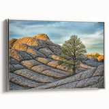Framed canvas depicting the landscape of Coyote Buttes in Arizona, with vivid earth tones, ideal for living room decor.