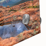 Large abstract depiction of Sedona landscape in vibrant red and orange tones on acrylic glass, ideal for dining room art.