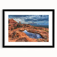 Extra large abstract art print of Sedona landscape in vibrant, colorful hues on a textured canvas, framed in black.