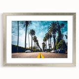 Textured abstract art print depicting Beverly Hills scenery in muted earth tones, framed in silver, ideal for bedroom decor.