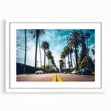 Abstract art print of Beverly Hills scenery in muted earth tones on a framed white mat, ideal for modern dining room decor.