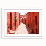 Abstract art print of Catalina scenery in muted blue and green tones, framed in white, ideal for dining room decor.