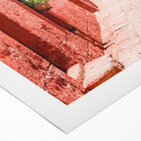 Art deco poster of Catalina, California on rolled canvas, featuring bold geometric shapes in blue and beige.