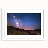 Abstract art print of Death Valley in muted earth tones on a white framed canvas, ideal for dining room decor.