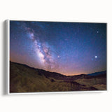 Vintage poster art of Death Valley in muted earth tones on a large framed canvas, ideal for living room decor.