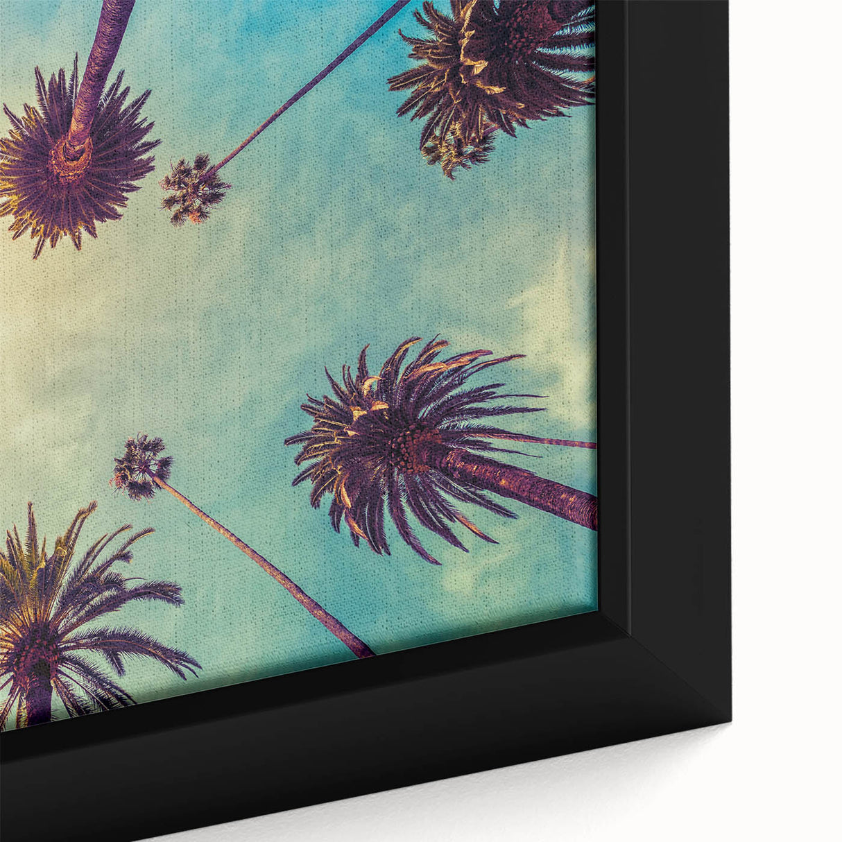 Framed canvas of Los Angeles skyline in textured black with colorful accents, ideal for living room decor.
