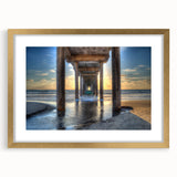 Extra large abstract art print of San Diego scenery in gold frame, featuring textured blue and green hues.