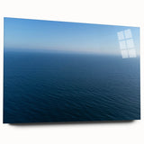 Large abstract wall art of Santa Monica scenery in muted blue and green tones on acrylic glass.