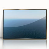 Acrylic print of Santa Monica scenery in muted gold and blue hues, framed in gold, suitable for modern art wall decor.