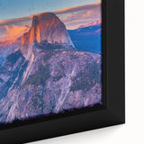 Extra large framed canvas depicting a textured depiction of Yosemite, with a black background and colorful art accents.