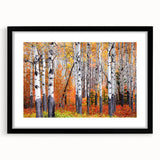 Abstract art print featuring vibrant colors and textured design, framed in black, ideal for living room decor.