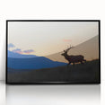 Large abstract wall art depicting the Rocky Mountains in muted earth tones, framed in black acrylic.