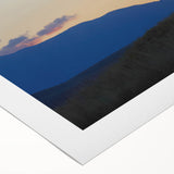 Art deco poster of the Colorado Rocky Mountains in muted earth tones on rolled canvas, suitable for dining room decor.