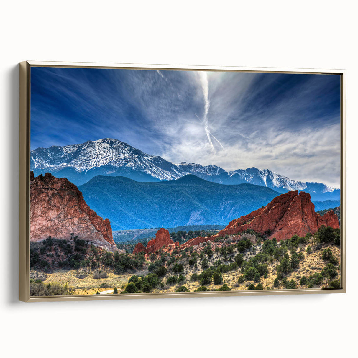 Framed canvas featuring a vintage-style landscape painting of Colorado Springs with muted gold and black tones.