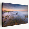 Side view of a stretched canvas featuring a serene Connecticut landscape in muted green and blue tones.