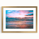 Extra large abstract art print featuring textured swirls in muted gold and cream tones, framed in gold.