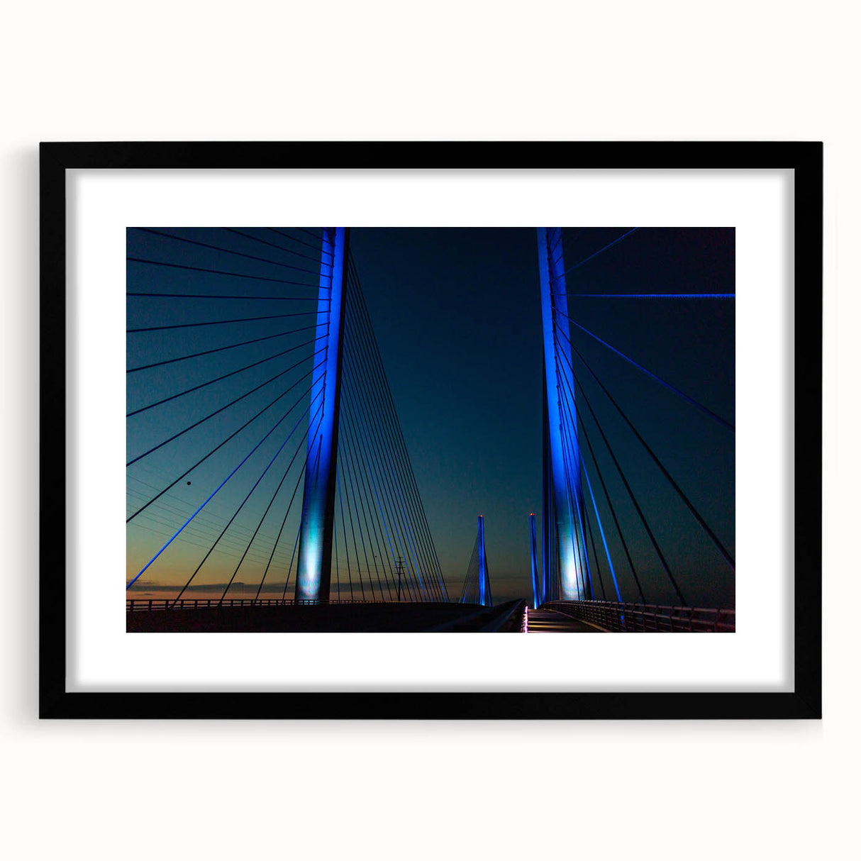 Abstract art print with vibrant, colorful textures on a large canvas, framed in black, suitable for living room decor.