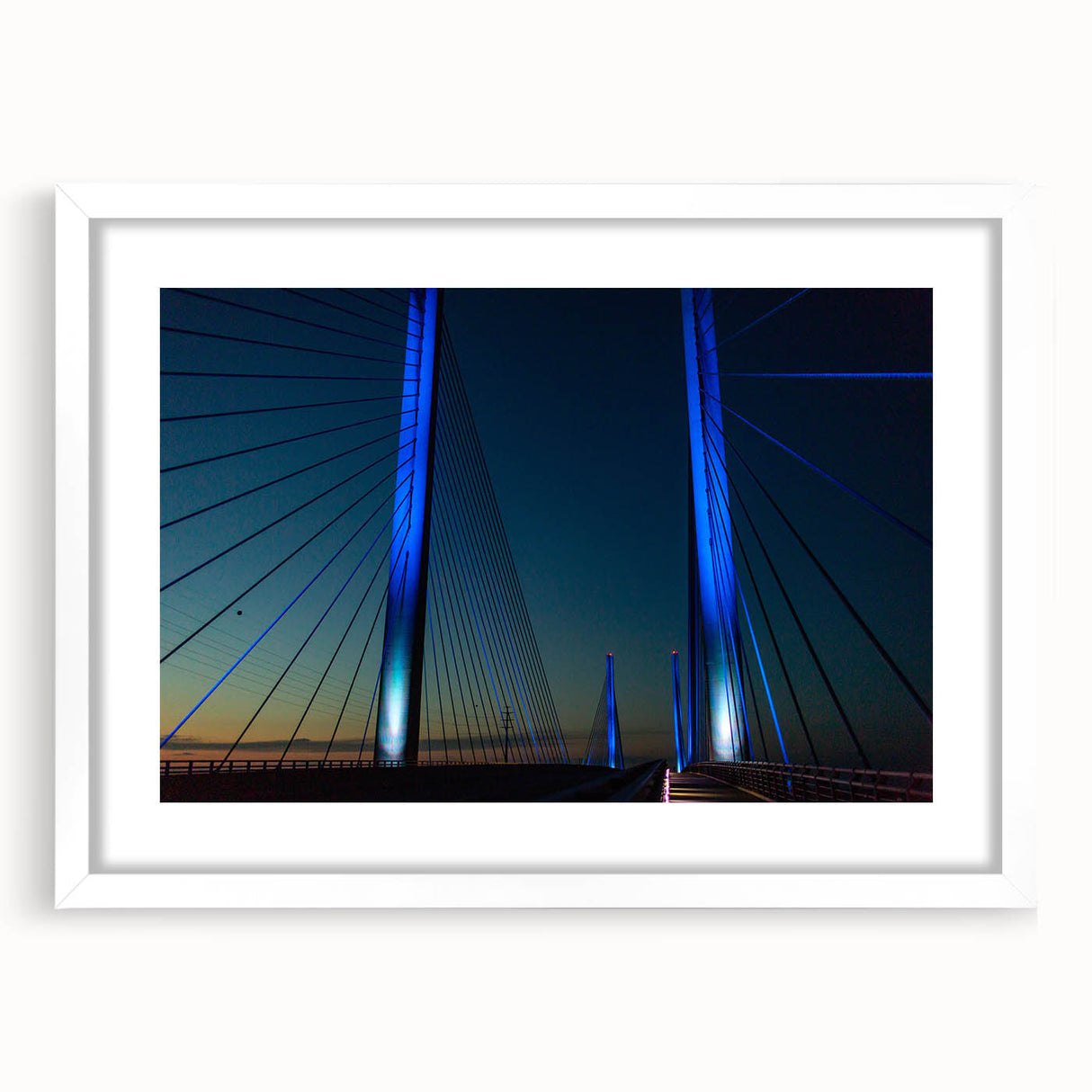 Abstract art print of Delaware scenery in muted blue and green tones on a framed white mat, suitable for dining room decor.