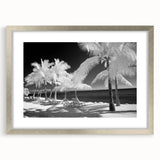 Textured abstract art print of the Florida Keys in muted blue and green tones on a framed silver mat.