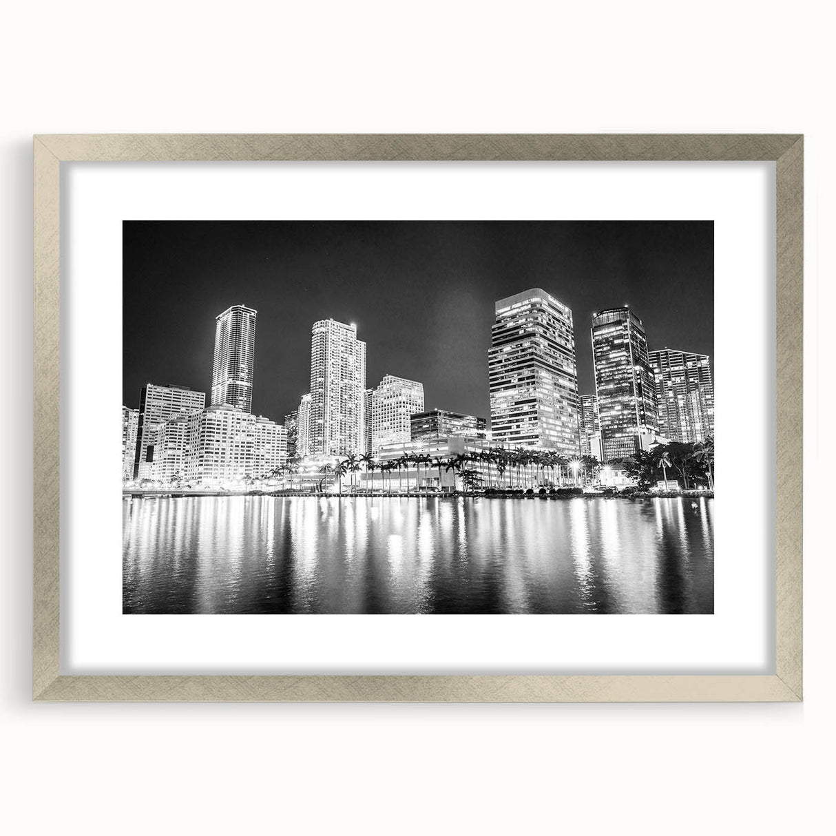 Textured art print of abstract Miami skyline in shades of blue and gray on a framed silver mat, suitable for bedroom decor.