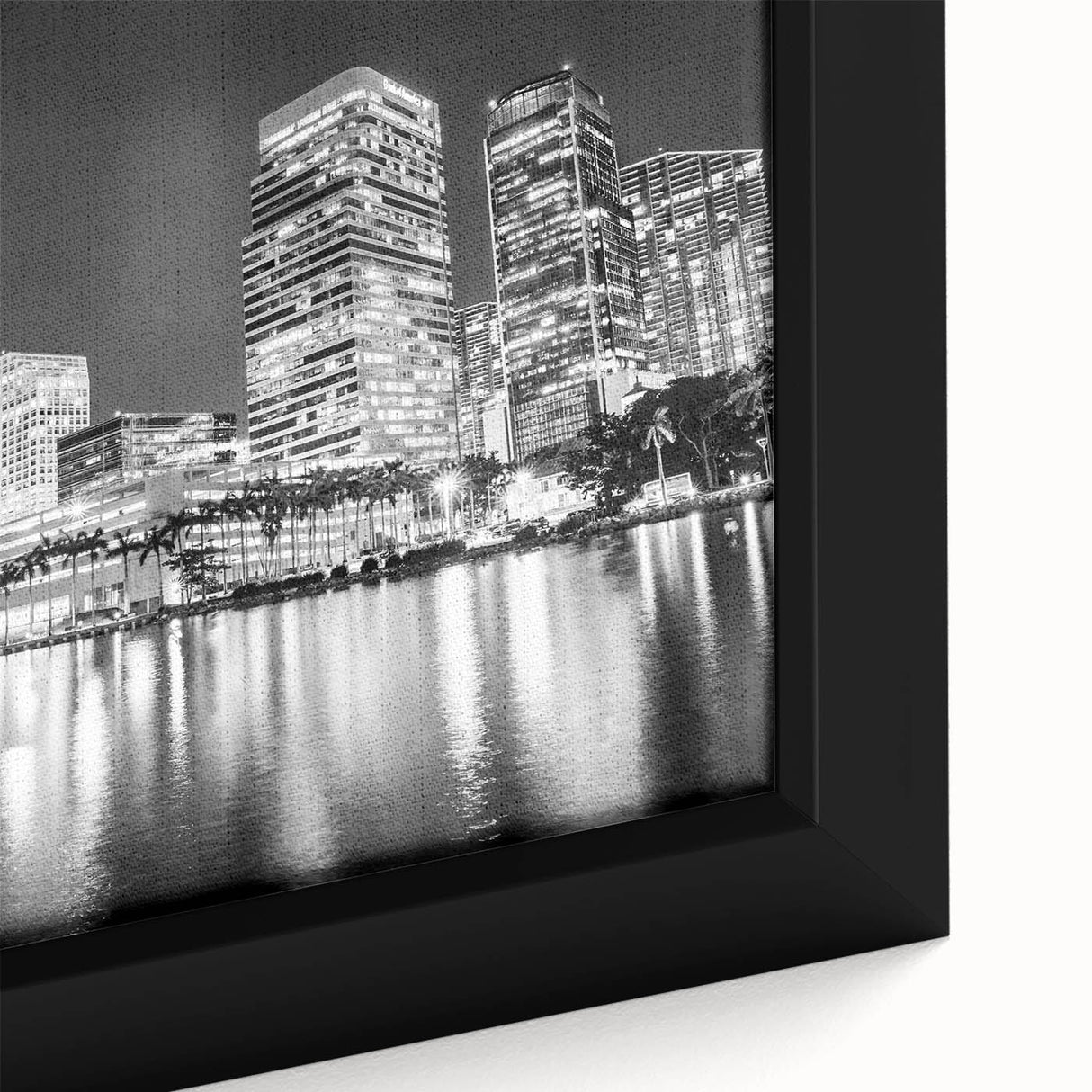 Close-up of textured Miami skyline on black canvas with vibrant, colorful accents, ideal for living room decor.