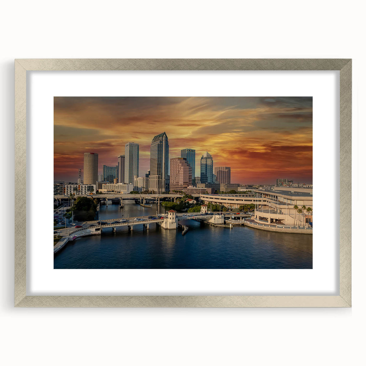 Textured art print of abstract Tampa skyline in muted gray and silver tones, framed with a silver mat.