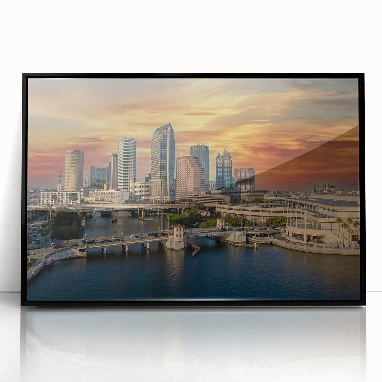 Large abstract wall art of Tampa scenery in muted blue tones on a black framed acrylic.